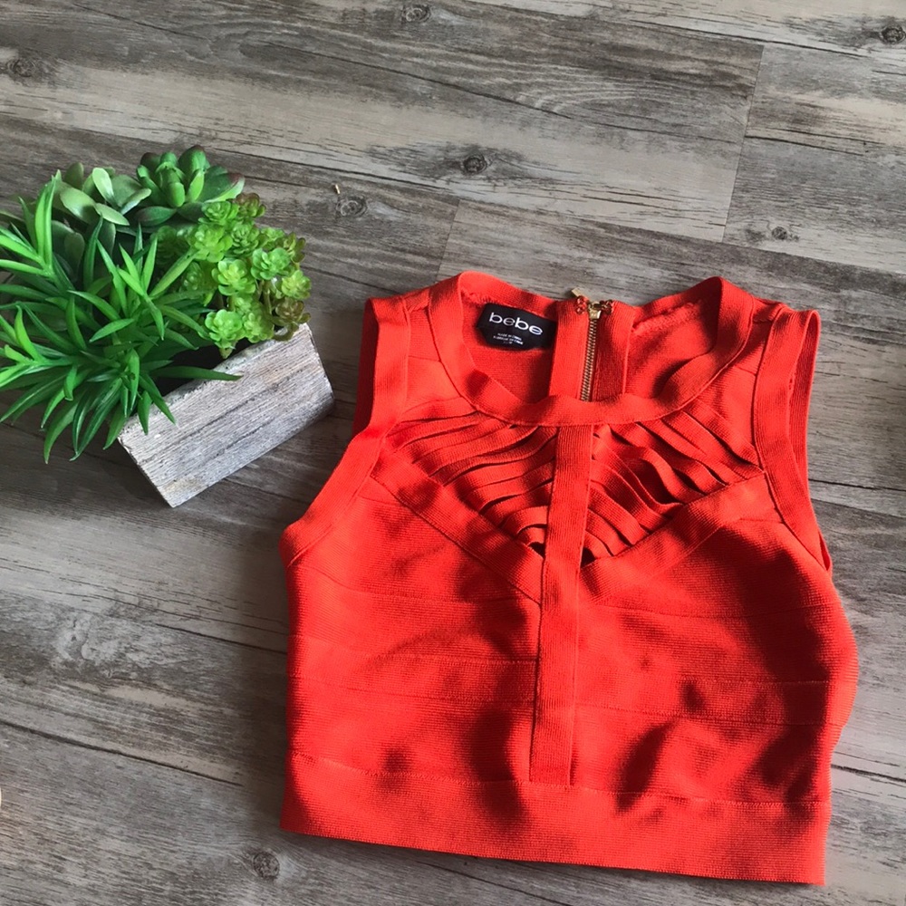 Bebe orange strappy bandage crop top.